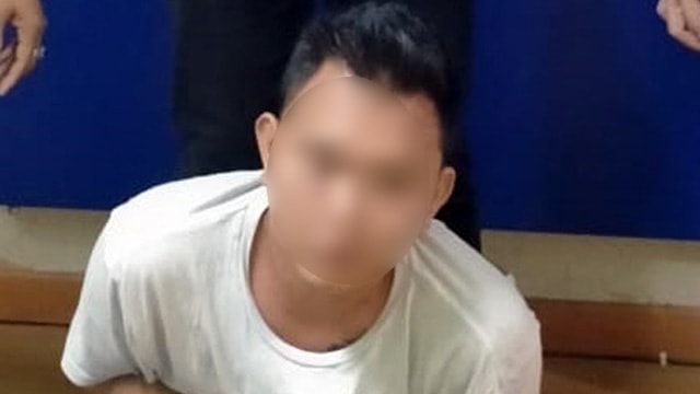 Tersangka penikaman di kawasan Megamas Manado. (foto: istimewa/Polda Sulut)