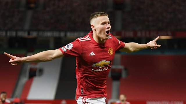 Scott McTominay dari Manchester United lakukan selebrasi gol saat melawan Leeds United di Old Trafford, Manchester, Inggris, Minggu (20/12).
 Foto: Pool via REUTERS/Michael Regan 