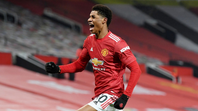 Selebrasi pemain Manchester United Marcus Rashford usai mencetak gol ke gawang Wolves pada pertandingan lanjutan Premier League di Old Trafford, Manchester, Inggris.
 Foto: Michael Regan/REUTERS