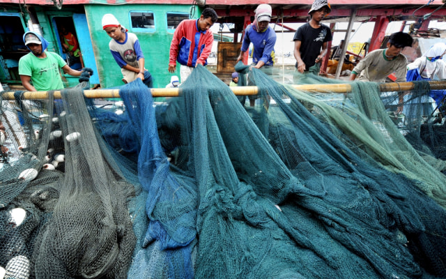 Ilustrasi tenaga kerja manufaktur. Foto: Adek Berry/AFP