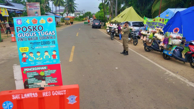 ILUSTRASI: Kawasan pintu masuk perbatasan Gorontalo-Sulawesi Utara. Minggu, (10/5). Foto: Dok banthayo.id (Rahmat Ali)