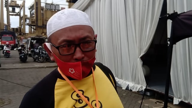 Syarif Rafiq keluarga korban Sriwijaya Air SJ 182 di JICT, Tanjung Priok, Jakarta Utara, Kamis (14/1). Foto: Fachrul Irwinsyah/kumparan