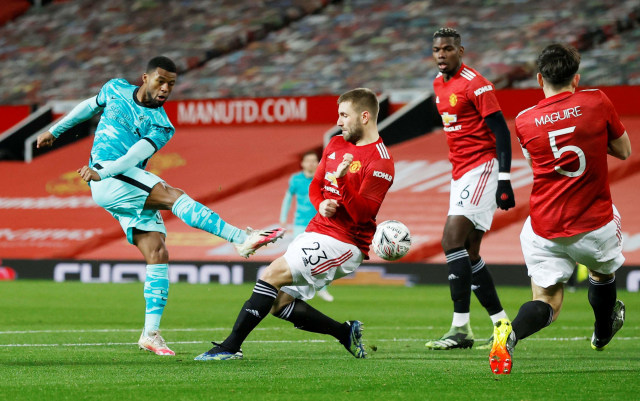 Pertandingan Piala FA antara Manchester United vs Liverpool di Old Trafford, Manchester, Inggris. Foto: Phil Noble/Reuters