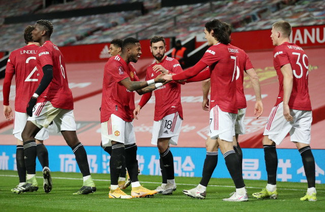 Selebrasi pemain Manchester United saat pertandingan Piala FA melawan Liverpool di Old Trafford, Manchester, Inggris. Foto: Martin Rickett/Reuters