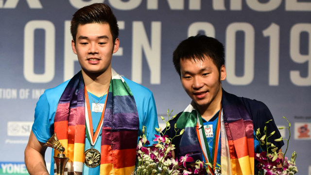 Ganda putra Chinese Taipei (Taiwan), Lee Yang/Wang Chi-Lin. Foto: STR / AFP