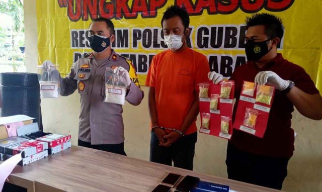 Pura-pura Jadi Driver Ojol, Pria Ini Kirim Sabu dan Ekstasi di Dalam Hard Disk