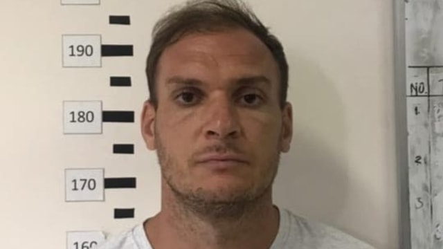 Buronan Interpol, berkebangsaan Rusia bernama Andrew Anyer alias Andrei Kovalenka. Foto: Dok. Imigrasi Ngurah Rai