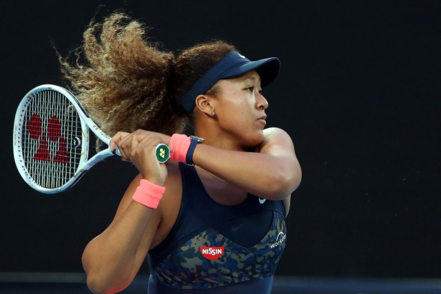 Petenis Naomi Osaka saat berhadapan dengan Jennifer Brady pada Final Australia Open di Melbourne Park, Melbourne, Australia. Foto: Kelly Defina/REUTERS