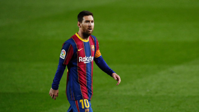 Pemain FC Barcelona, Lionel Messi saat pertandingan La Liga Santander  melawan Elche di Camp Nou, Barcelona, Spanyol, Rabu (24/2/2021). Foto: Albert Gea/REUTERS
