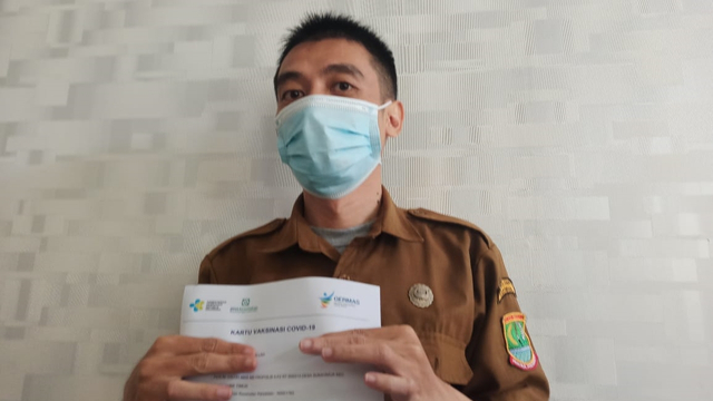 Yelu Manda (38), PNS di Karawang yang takut jarum suntik saat divaksin. Foto: Dok. Istimewa