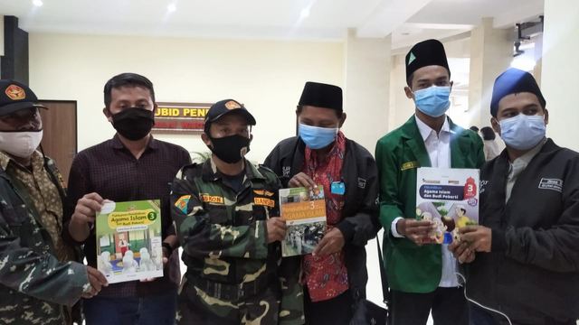 Pengurus GP Ansor Kota Semarang usai mengadukan PT Tiga Serangkai ke Polda Jateng. Foto: Dok. Istimewa