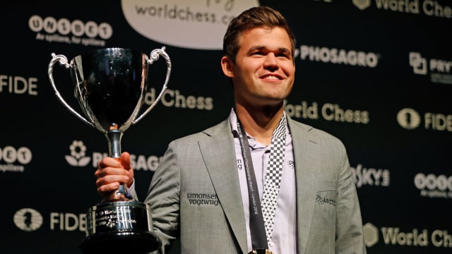 Juara catur dunia Magnus Carlsen dari Norwegia. Foto: Tolga AKMEN / AFP