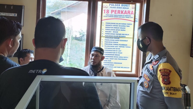 Mahmud di Kantor polisi. Foto: Dok. Istimewa