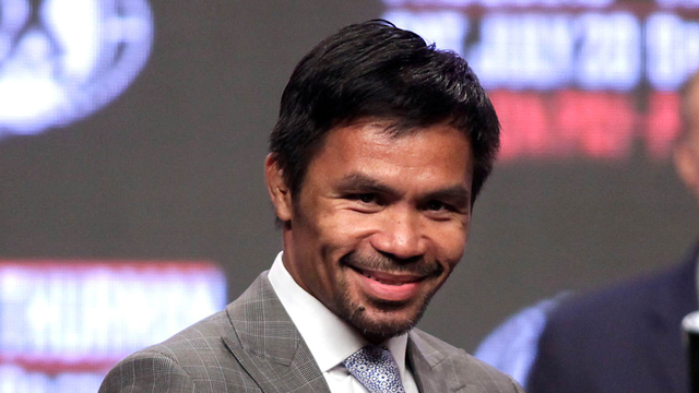 Petinju, Manny Pacquiao. Foto: John Gurzinski/AFP