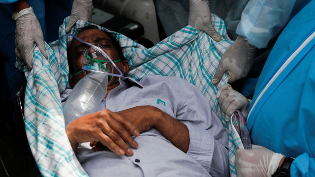 Seorang pasien terinfeksi virus corona di India Foto: Francis Mascarenhas/REUTERS