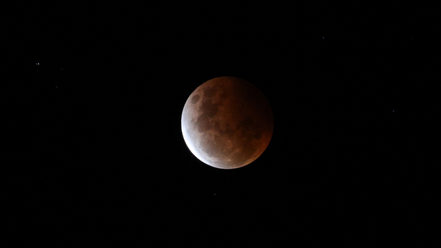 Ilustrasi gerhana Bulan. Foto: Loren Elliott/REUTERS