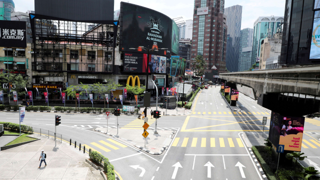 Hari pertama lockdown nasional di Malaysia. Foto: REUTERS/Lim Huey Teng