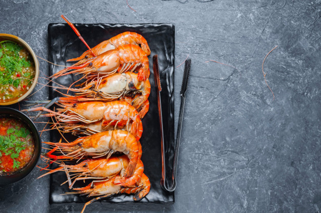 ilustrasi udang goreng mentega, sumber gambar: https://www.freepik.com/