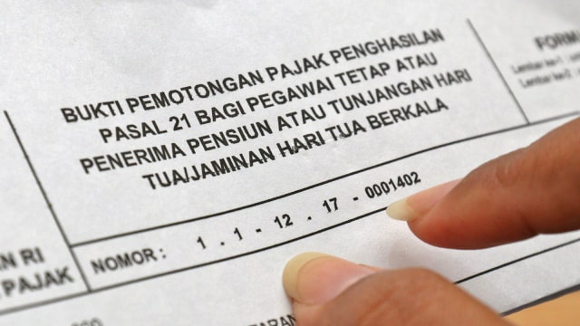 Perhitungan Pajak Penghasilan. Foto: Jamal Ramadhan/kumparan