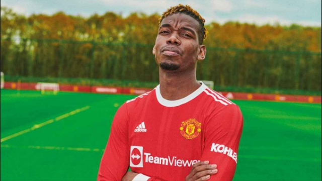 Paul Pogba dengan jersi baru MU Foto: admin