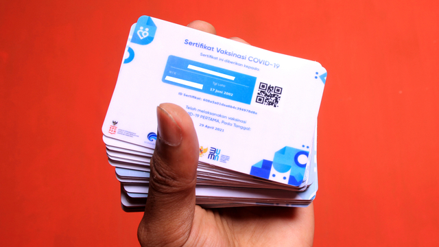 Ilustrasi sertifikat vaksin COVID-19. Foto: Shutter Stock