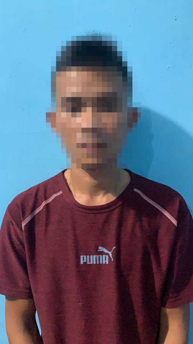 Tersangka SZ saat diamankan di Mapolres Nias Utara. Foto: Dok. Istimewa