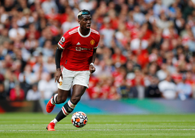 Pemain Manchester United Paul Pogba beraksi pada pertandingan Premier League antara Manchester United melawan Leeds United di Old Trafford, Manchester, Inggris - 14 Agustus 2021. Foto: Phil Noble/Reuters