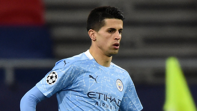 Pemain Manchester City, Joao Cancelo. Foto: Attila Kisbenedek/AFP