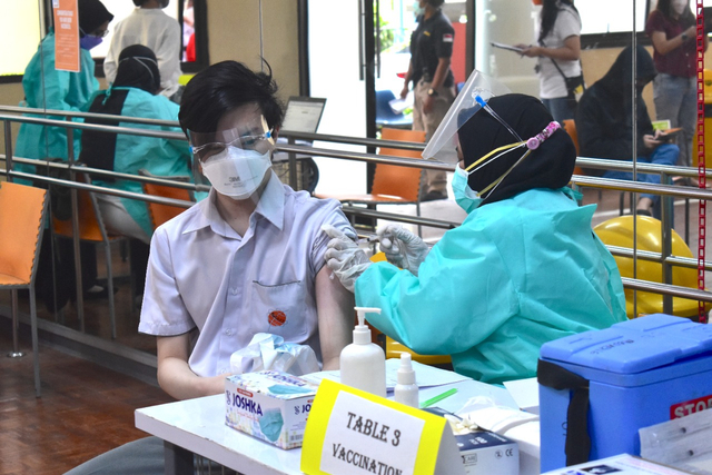 Salah satu peserta vaksin yang digelar Singapore National Academy (SNA). Foto: Istimewa