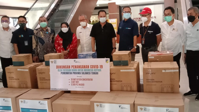 Yayasan BUMN Serahkan Bantuan Penanganan COVID-19 ke Pemkot Palu. Foto: Tim PaluPoso