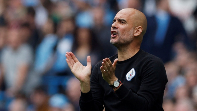 Manajer Manchester City Pep Guardiola bereaksi di Stadion Etihad, Manchester, Inggris, Minggu (22/5/2022). Foto: Action Images via Reuters/Jason Cairnduff