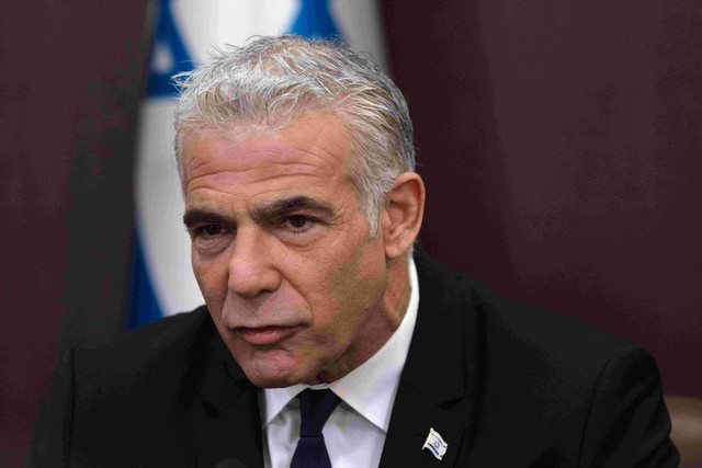 Perdana Menteri Israel, Yair Lapid. Foto: Maya Allezuro/POOL/AFP