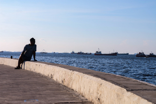 Ilustrasi seseorang duduk menyendiri, menggambarkan kejombloan. Foto: Lutfi Sheykal