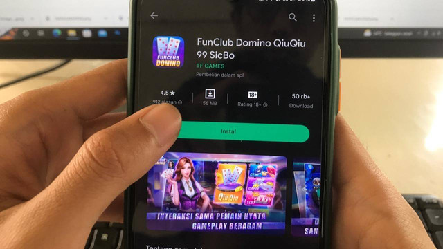 Aplikasi Domino QiuQiu yang disebut sebagai aplikasi judi online. Foto: Arif Ute