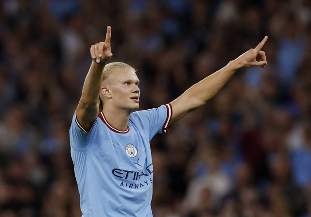 Pemain Manchester City Erling Braut Haaland merayakan  gol ketiga mereka saat pertandingan Liga Premier Stadion Etihad, Manchester, Inggris. Foto: Jason Cairnduff/Reuters