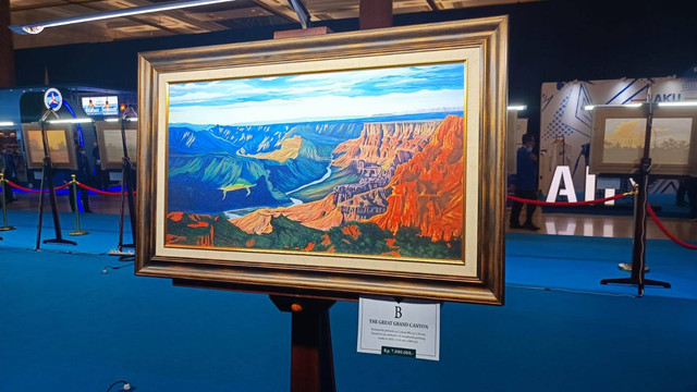 Pameran print lukisan Presiden RI ke-6 Susilo Bambang Yudhoyono (SBY) di Rapimnas Demokrat, JCC, Kamis (15/6/2022). Foto: Annisa Thahira Madina/kumparan