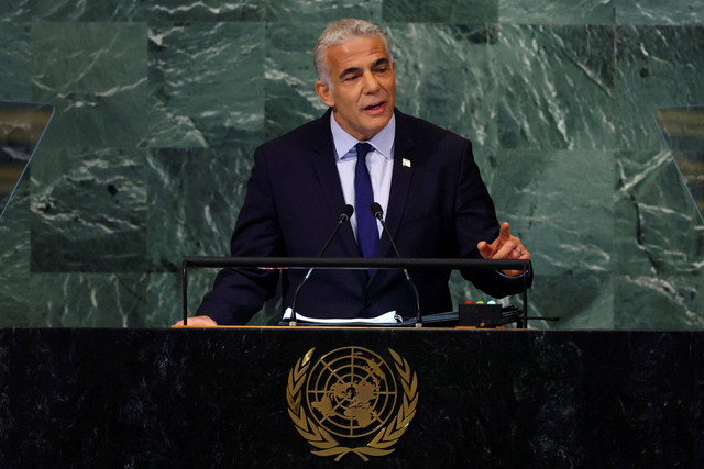 Perdana Menteri Israel Yair Lapid berpidato di Sesi ke-77 Majelis Umum PBB di Markas Besar PBB di New York City, AS. Foto: Mike Segar/REUTERS