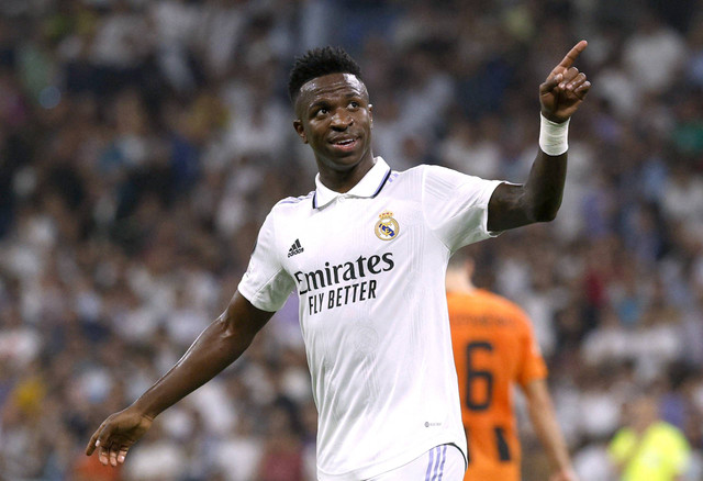 Pemain Real Madrid Vinicius Junior merayakan gol keduanya saat melawan Shakhtar Donetsk pada pertandingan Liga Champions di Santiago Bernabeu, Madrid, Spanyol. Foto: Susana Vera/Reuters
