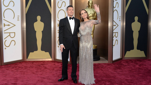 Angelina Jolie dan Brad Pitt resmi bercerai. Foto: Robyn Beck / AFP