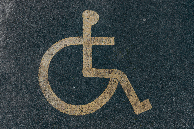https://www.pexels.com/photo/painted-disability-icon-on-asphalt-pavement-11074333/