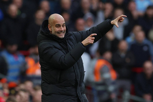 Pep Guardiola saat laga Liverpool vs Man City di Stadion Anfield dalam lanjutan Liga Inggris 2022/23 pada 16 Oktober 2022. Foto: REUTERS/Phil Noble