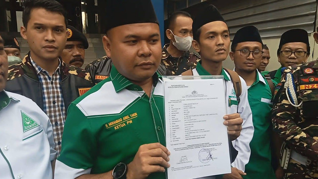 GP Ansor DKI Jakarta laporkan Faizal Assegaf di Polda Metro Jaya, Selasa (8/11). Foto: Dok. Istimewa