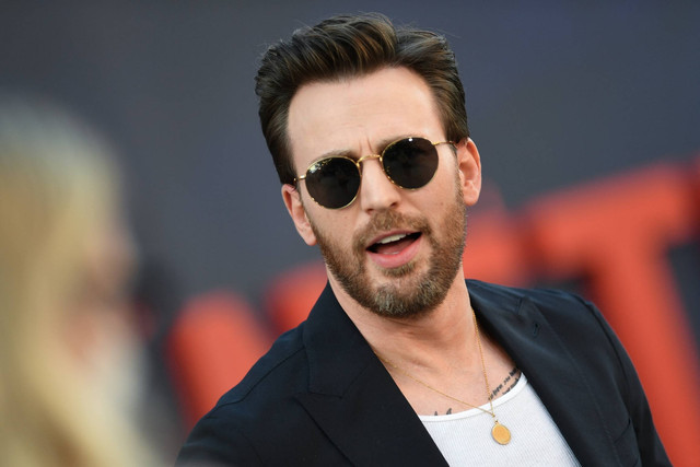 Aktor Chris Evans menghadiri Pemutaran Perdana Dunia "The Grey Man" Netflix di teater China di Hollywood, California, 13 Juli 2022. Foto: Valerie Macon/AFP
