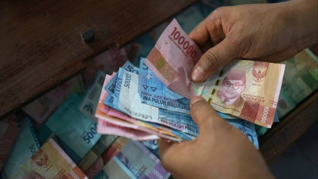 Ilustrasi uang. Foto: Getty Image