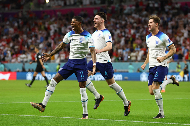 Selebrasi pemain Timnas Inggris Marcus Rashford usai mencetak gol ke gawang Timnas Wales pada pertandingan Grup B Piala Dunia 2022 Qatar di Stadion Ahmad Bin Ali, Al Rayyan, Qatar. Foto: Hannah McKay/REUTERS