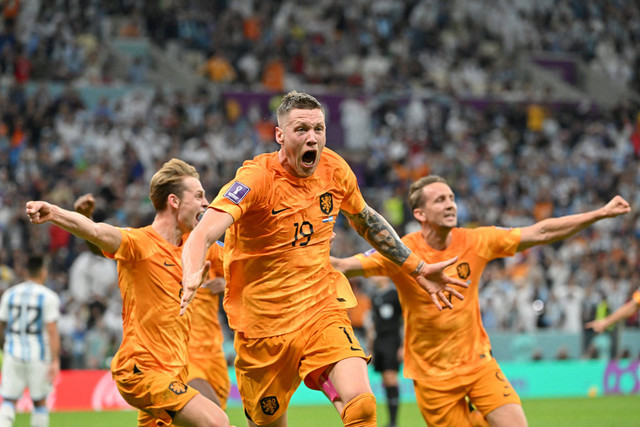 Selebrasi pemain Timnas Belanda Wout Weghorst usai mencetak gol ke gawang Timnas Argentina pada pertandingan perempat final Piala Dunia 2022 Qatar di Stadion Lusail, Doha, Qatar.
Foto: Alberto PIZZOLI / AFP