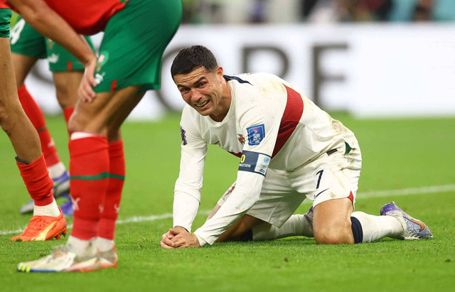 Ekspresi pemain Portugal Cristiano Ronaldo saat melawan Maroko di Piala Dunia 2022, Sabtu 10 Desember 2022. Foto: Carl Recine/REUTERS