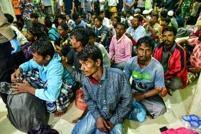 Sejumlah pengungsi Rohingya berada di lokasi penampungan sementara di SMP Negeri 2 Curei, Kecamatan Muara Tiga, Kabupaten Pidie, Aceh, Senin (26/12/2022). Foto: Joni Saputra/ANTARA FOTO