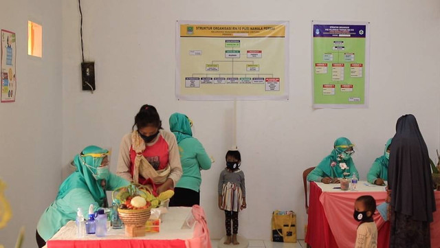 Ilustrasi kegiatan pemberian suplemen vitamin A di Posyandu. Foto: Kemenkes RI