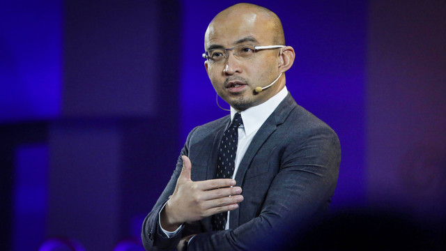 Bao Fan, pendiri dan CEO China Renaissance, berbicara di Phoenix Finance Summit 2014 di Beijing, China, 18 November 2014. Foto: Reuters